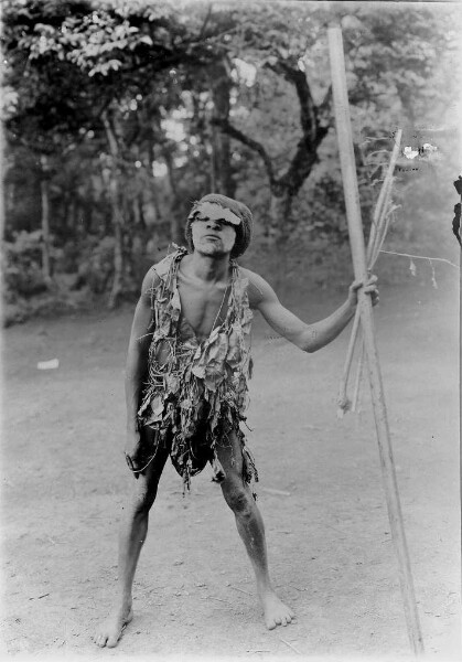 Man with leaf cape