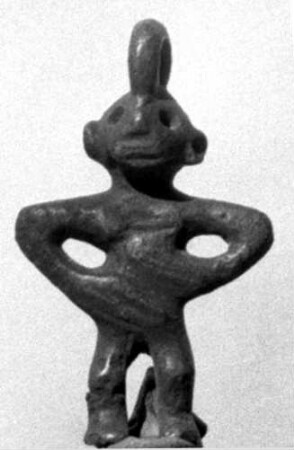 Amulettfigur einer nackten Frau
