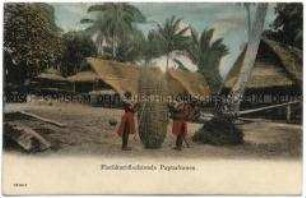 Papua-Frauen beim Flechten von Fischreusen