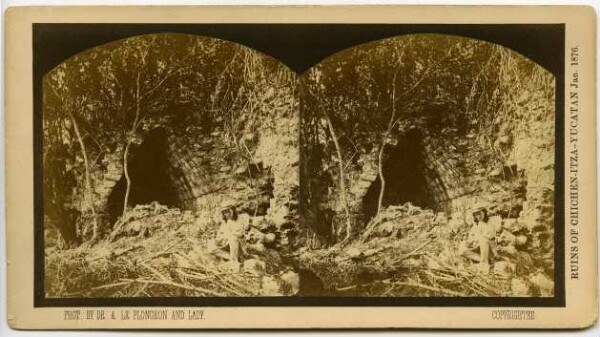 Remains of a wall in the wilderness. Madame Le Plongeon in the foreground