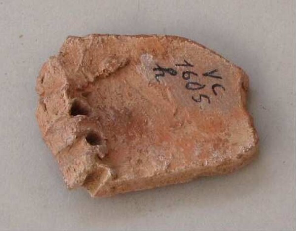 Fragment of a clay vessel