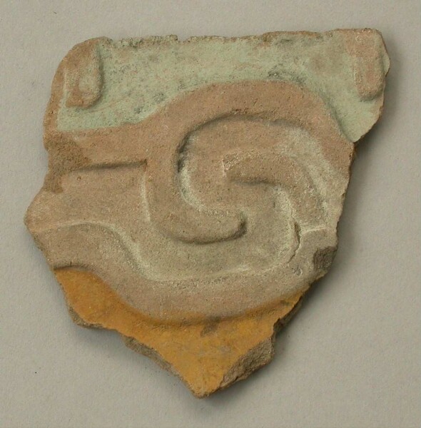 Fragment of a clay relief slab