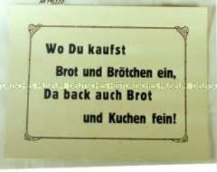 Schild "Wo Du kaufst Brot und Brötchen ein, ..."