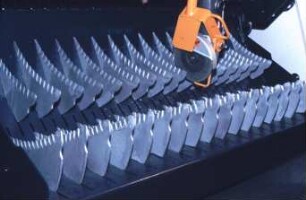Automatische Schleifeinrichtung am Ladewagen