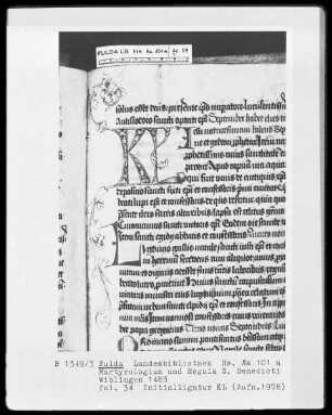 Martyrologium und Regula Sancti Benedicti — KL-Ligatur mit anschließender Ranke, Folio 34recto