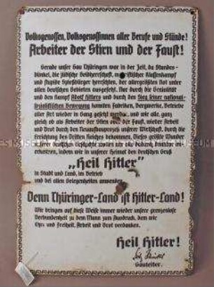 Schild "Arbeiter der Stirn und der Faust"
