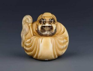Netsuke (Daruma mit einem Wedel)