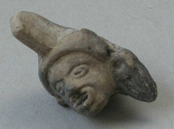 Fragment of a clay rattle (clay head)