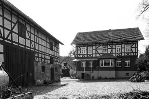 Wohnhaus (Aussiedlerhof, Fachwerk und Ziegelmauerwerk); Gemünden, Forsthausstraße 2