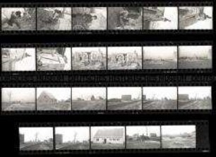Schwarz-Weiß-Negative mit Aufnahmen vom Wiederaufbau des Dorfes Gorgast im Oderbruch (Unterkunftshütten und Neubauten, Bretterhütten werden winterfest gemacht)