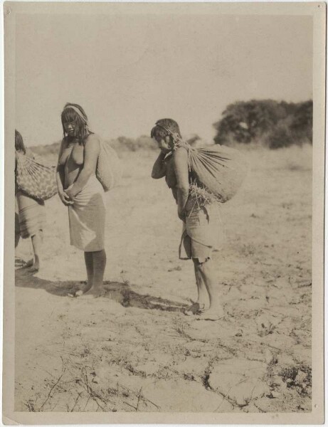 Choroti women return from the forest after collecting fruit