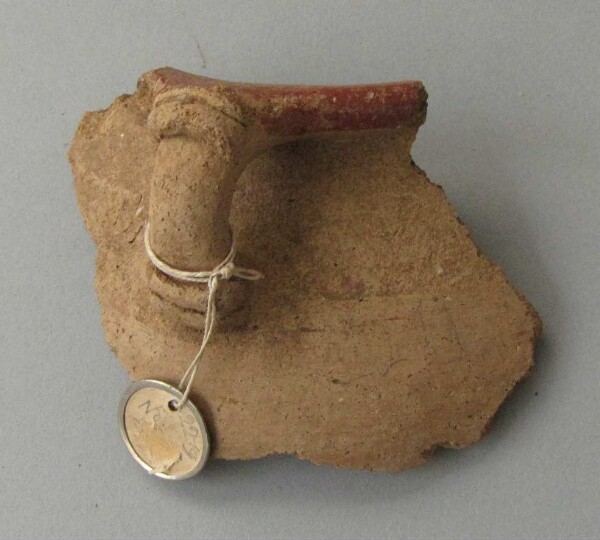 Rim sherd of a clay vessel