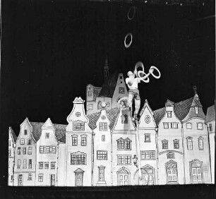Scala: Fredy Zay; 6 m hoch auf Rad; mit Ringen; (auch am Bein ein Ring)
