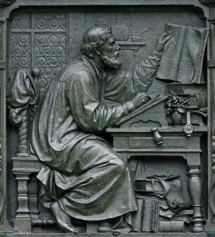 Denkmal für Martin Luther — Sockelrelief: Luther in der Studierstube