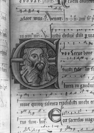 Antiphonarium Sedlecense — Initiale E Haupt eines Heiligen gerahmt von einem Drachenornament, Folio 471