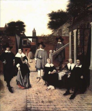 Familie im Hofraum ihres Hauses