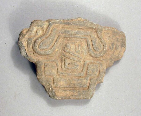 Fragment of a clay vessel