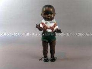 Schildkröt-Puppe, dunkelhäutig, mit Trachtenkleidung