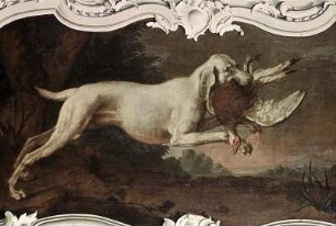 Hund mit totem Fasan im Maul
