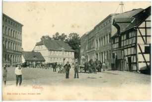 Köslin. Straße mit Pferdefuhrwerken