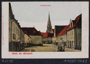 Der Marktplatz in Wilsdruff mit der Dresdner Straße und der Nikolaikirche