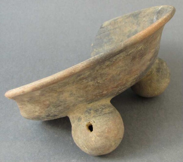 Fragment of a tripod clay bowl