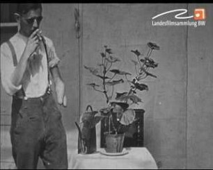 Männer mit Krukenberg-Zange und Armprothese in Alltagssituationen (1923-1925)