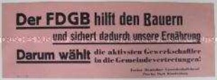 Maueranschlag mit einer Propaganda-Losung des FDGB
