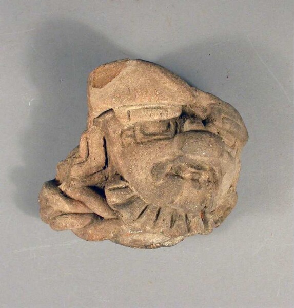 Fragment of a clay vessel