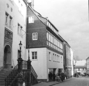 Bad Schandau, Poststraße 10. Wohnhaus mit Ladeneinbau (1701/1800). Straßenansicht von Westen