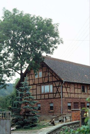 Backsteinscheune mit Fachwerk, zu Wohnzwecken umgebaut