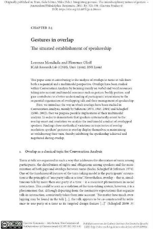 Gestures in overlap. The situated establishment of speakership