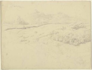 Hügelige Landschaft, im Hintergrund aufziehende Wolken