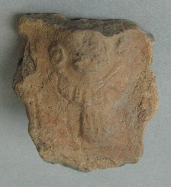 Clay head (fragment)