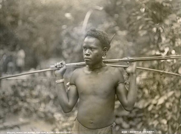 "Roas boy with bow and arrows, S.W. Malaita"