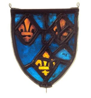 Farbglasscheibe in Schildform mit heraldischen Lilien. Zugehörig zu einer Gruppe von vier Scheiben (vgl. Gm.003, 146, 147)
