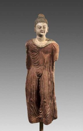 Stehender Buddha mit rotem Gewand