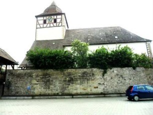 Ansicht von Norden mit Kirche über Kirchhofmauer (Kirchhof aufgelassen-Wehrgang der Kirchhofmauer abgetragen)