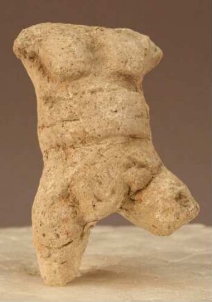 Torso eines kämpfenden Pygmäen