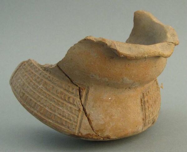 Fragment of a clay vessel