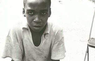 Reisefotos Haiti. Port-au-Prince. Porträt eines afrikanischen Jungen