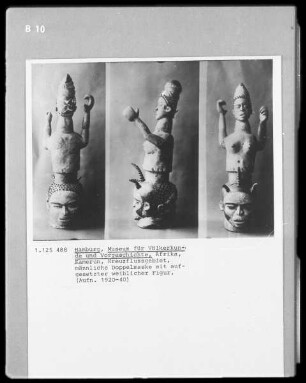 männliche Doppelmaske mit aufgesetzter weiblicher Figur