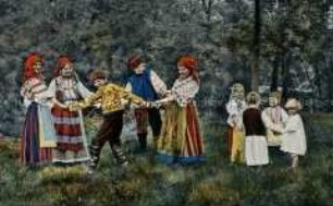 Mann, Frauen und Kinder in ukrainischer Volkstracht beim Tanz
