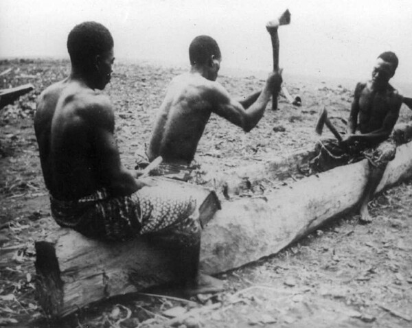 Bakwiri building a canoe