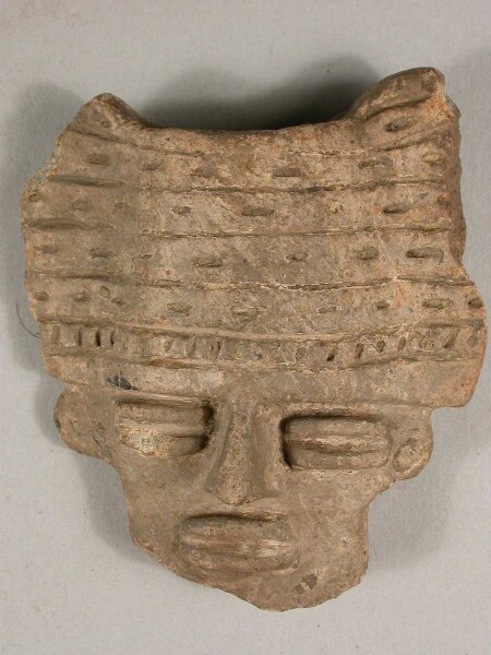 Head of a male figure