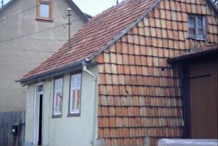 sehr kleines Wohnhaus, Giebel ziegelverkleidet