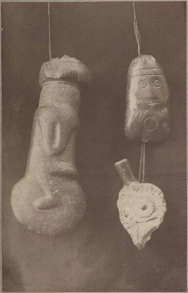 Two anthropomorphic stone objects and a zoomorphic ceramic head