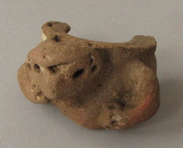 Pottery vessel decoration (fragment)