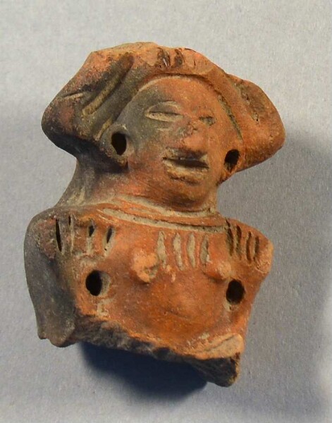 Upper body with head of a clay figure