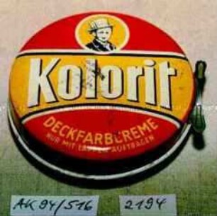 Blechdose mit Verschlusshebel für Schuhputzmittel "Kolorit DECKFARBCREME" (Abbildung eines Jungen mit Zylinder)